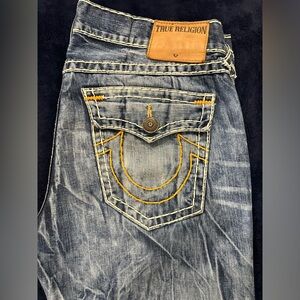 True Religion Ricky Super T Jeans with the leather patch. In excellent shape
